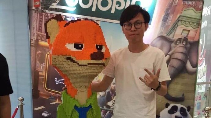 Zhao and his Lego sculpture of Nick from Zootopia