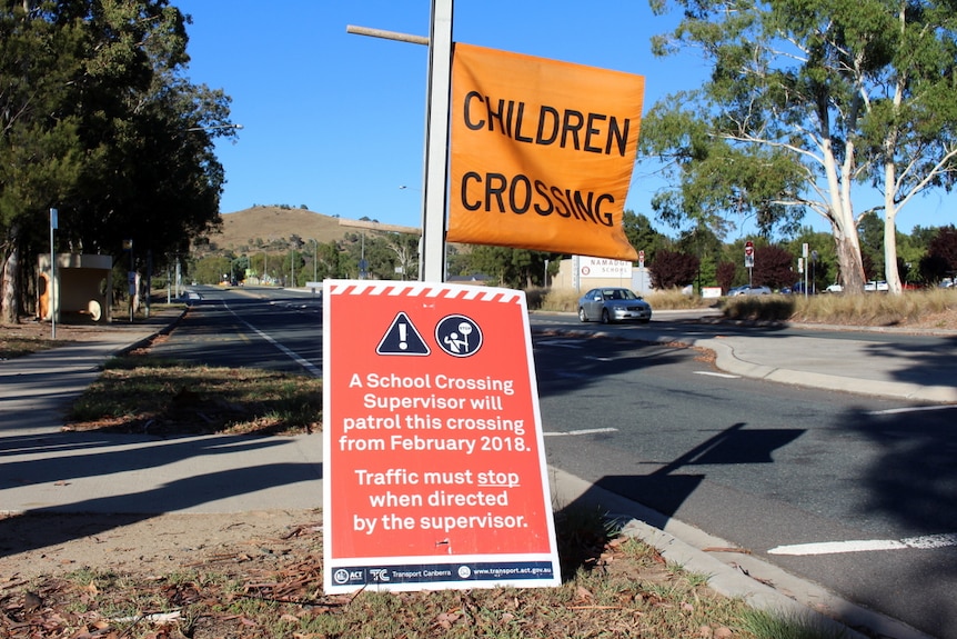 A children crossing sign erected at a road crossing outside a Canberra school.
