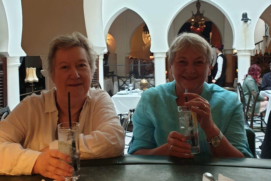 Andrea McCall and Christine Fyffe sit in a Moroccan restaurant.