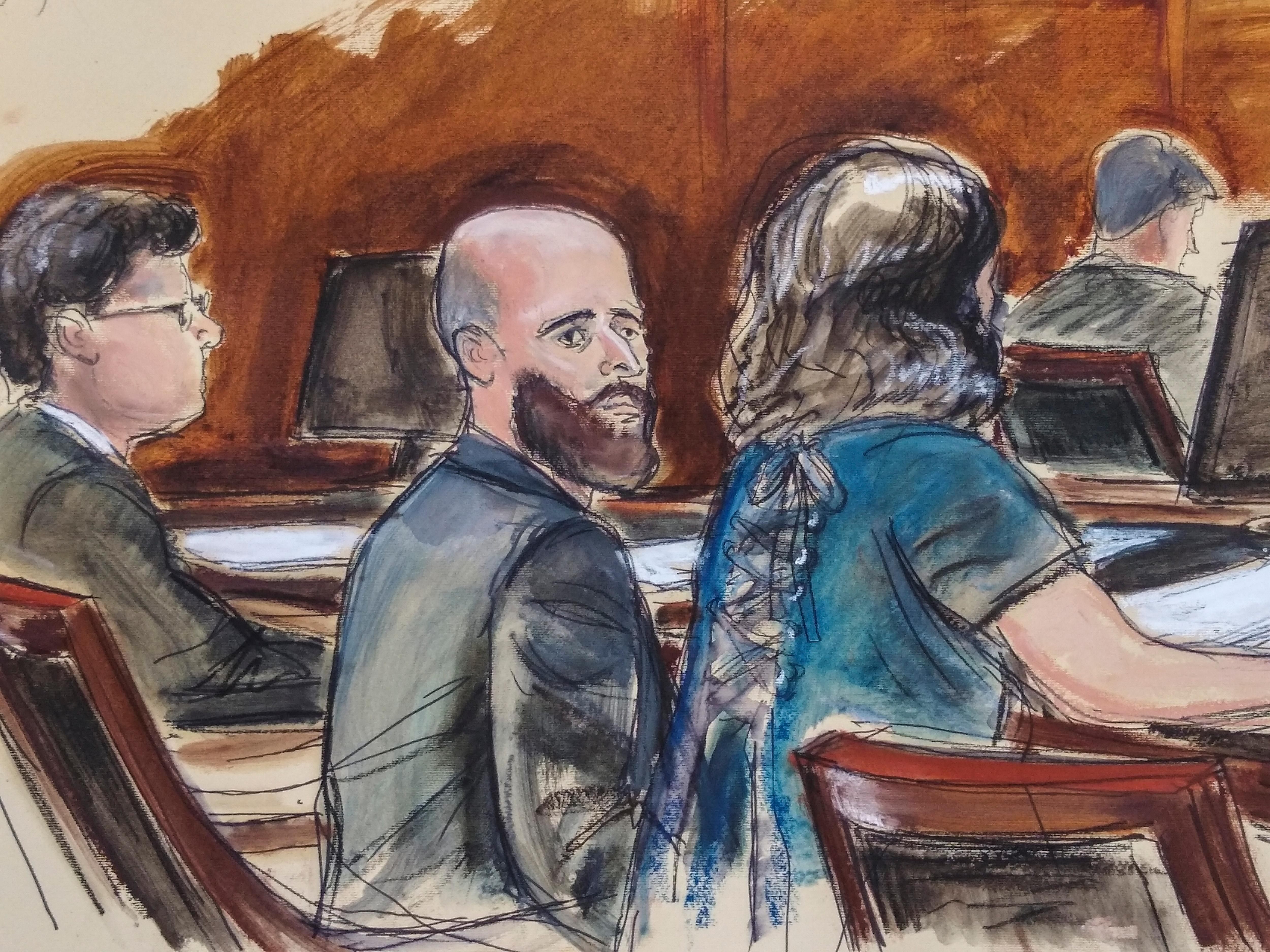 A court sketch shows a bald man with a large beard.