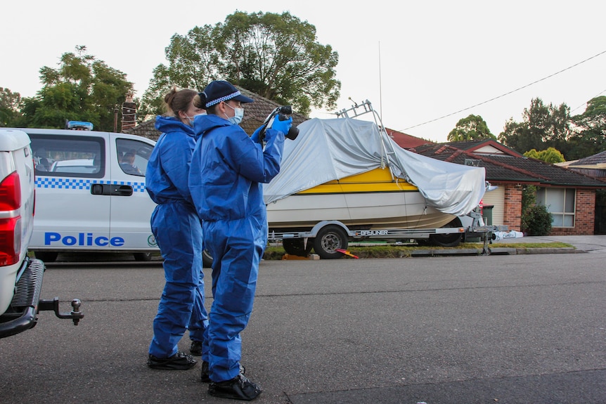 police in blue PPE