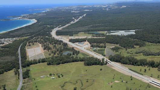 Aerial of a road and paddocks