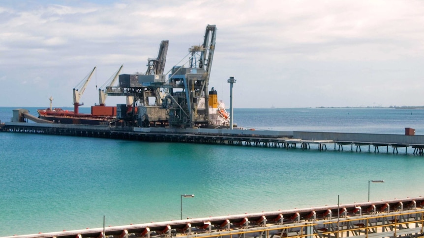 A ship is loaded at the Kwinana Bulk Terminal.