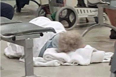 Facebook image of 95 year old woman on hospital floor in Hobart