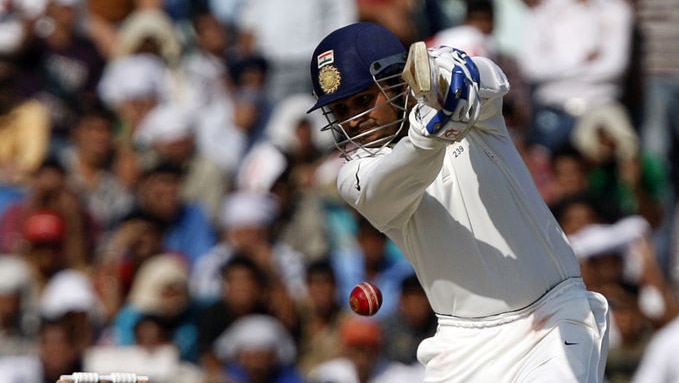 Came out firing ... Sehwag clobbered the Aussie attack for 10 fours in his knock of 59.