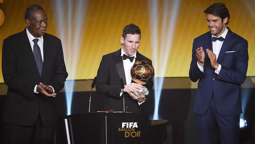Barcelona's Lionel Messi speaks to the audience after receiving the FIFA Ballon d'Or award.