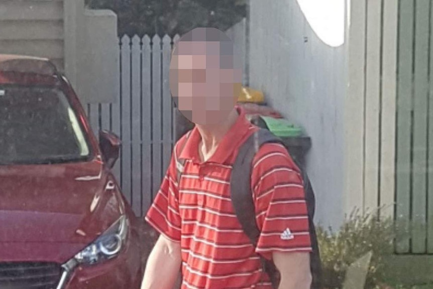 A blurred photo of a man who allegedly assaulted Brisbane bus passengers.