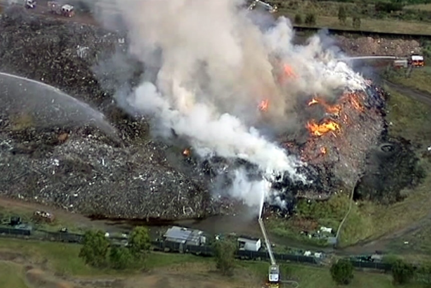 Fire fighters battle a blaze at an abandoned tip in Somerton.