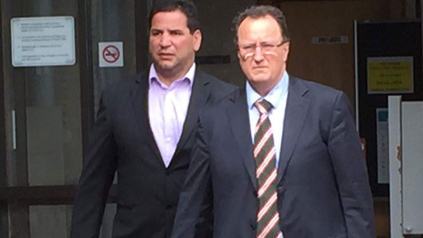 Carl Webb and his lawyer Anderson Telford outside Cairns Magistrates Court on Tuesday