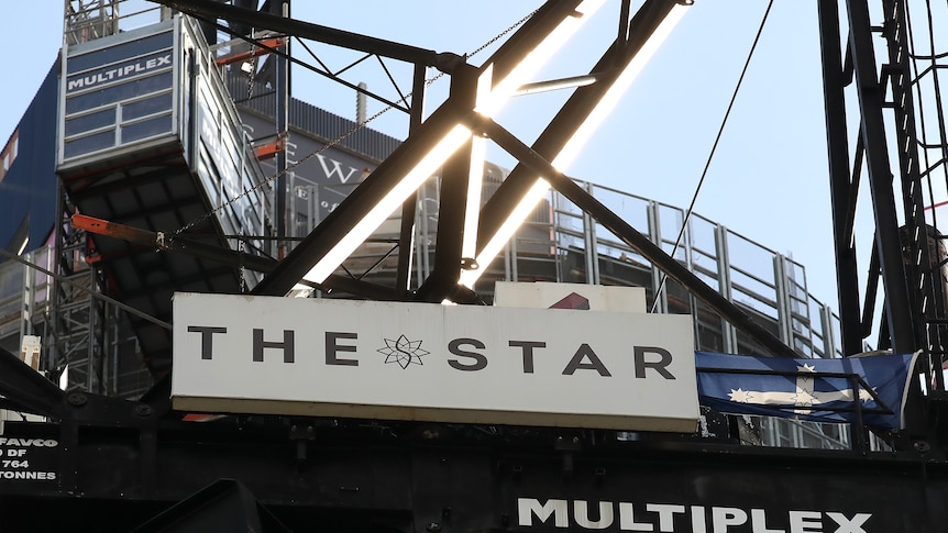 A sign that says "The Star", affixed to a multiplex.