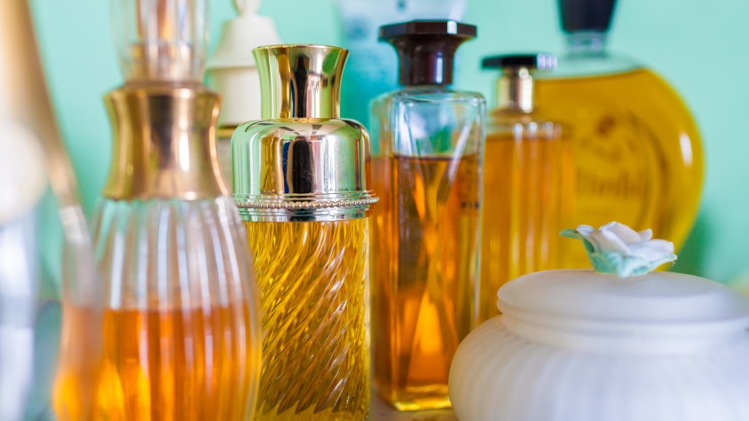 A collection of glass perfume bottles.