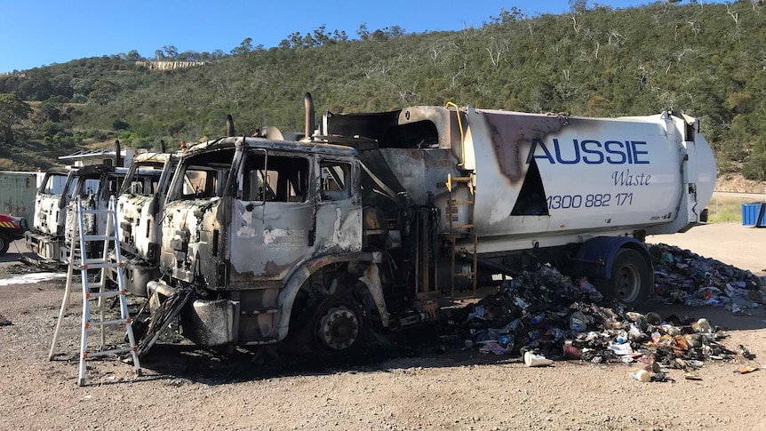 Four garbage trucks catch fire.