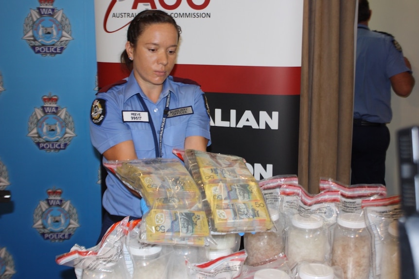 Police seize cash, drugs