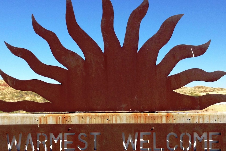 A road-side welcome sign for Marble Bar.