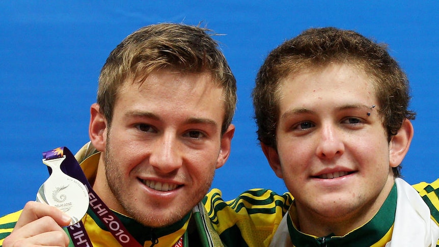 Another one in the bag ... Matthew Mitcham and Ethan Warren pose with their silver medals.