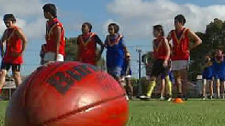 Young migrants are being encouraged to take up football