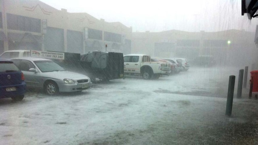 Wild weather: Hail pelts down on cars in Penrith.