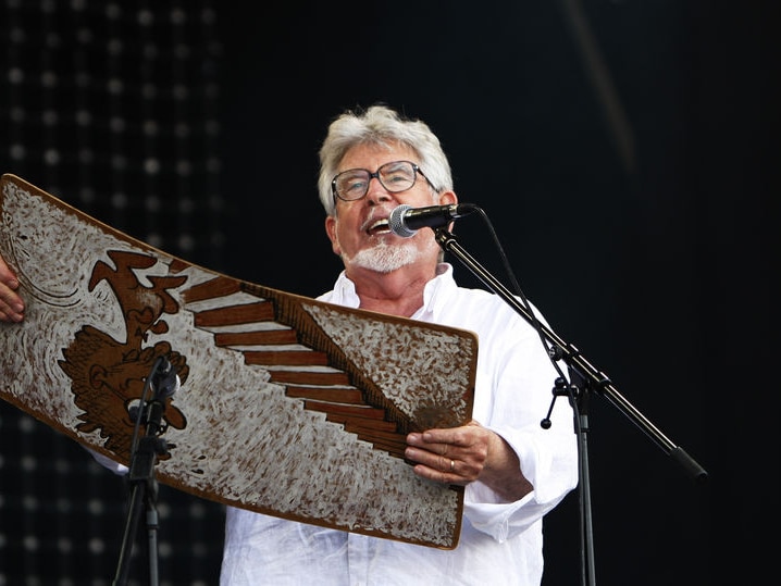 Rolf Harris performs with his wobble-board