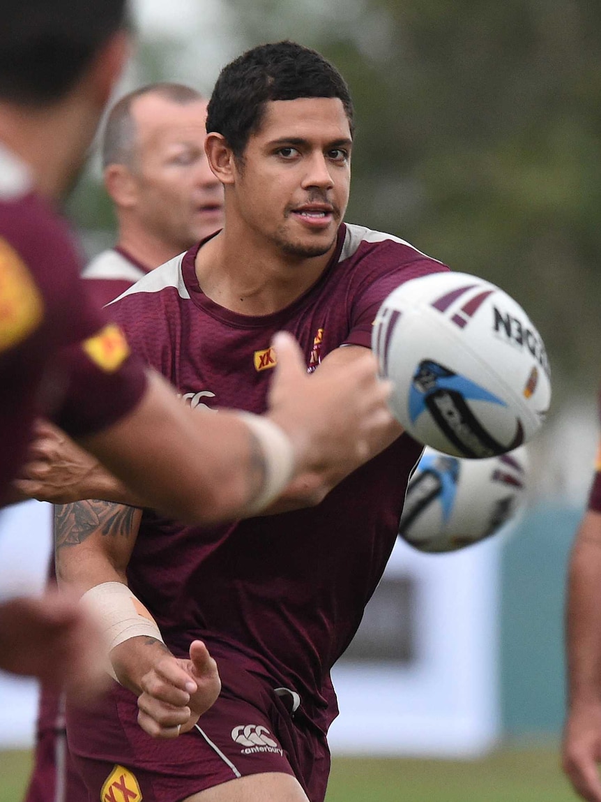 Dane Gagai throws a pass during his first Maroons training session