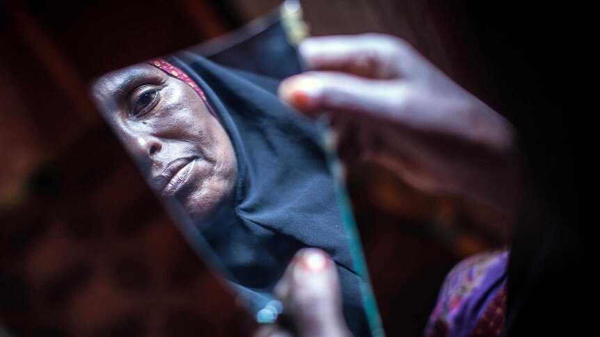 Somali woman Amran Mahamood practices the centuries' old tradition of female circumcision.