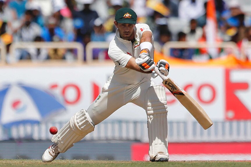 Glenn Maxwell plays a shot for Australia on day one in Ranchi