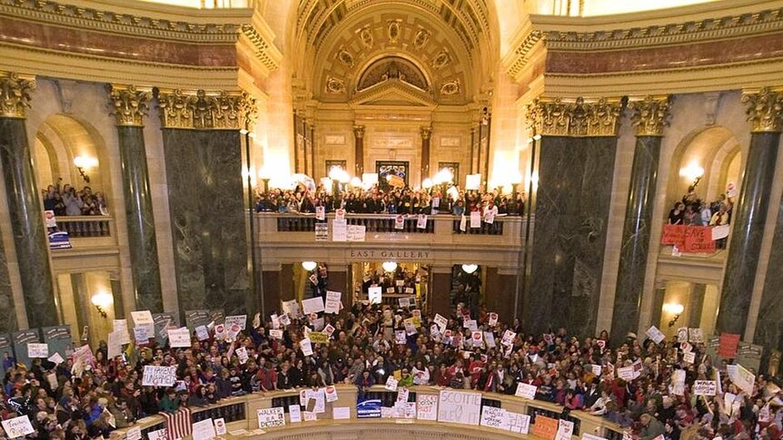 Packed in: protesters fill the Rotunda at the State Capitol building in Madison.
