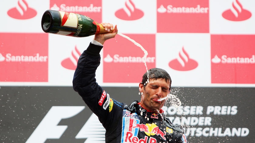 Webber swills the champagne