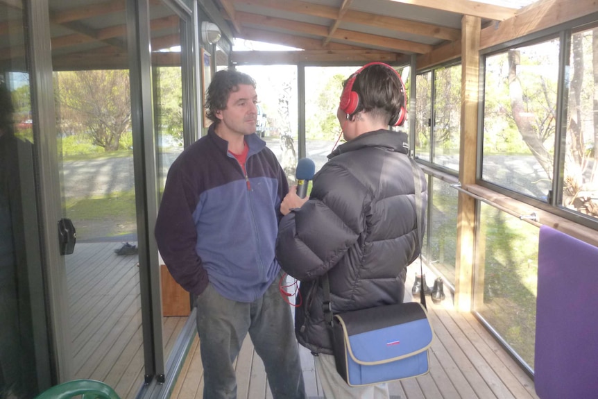 Ben Boyle speaks with Polly McGee at his home in Tranquil Point, 31 July 2014.