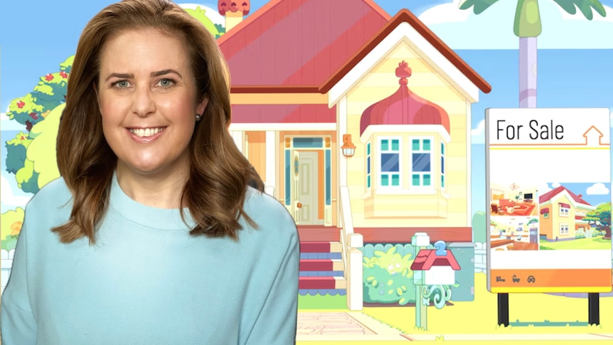 A picture of a woman with brown hair smiles while a cartoon multicoloured house sits behind 