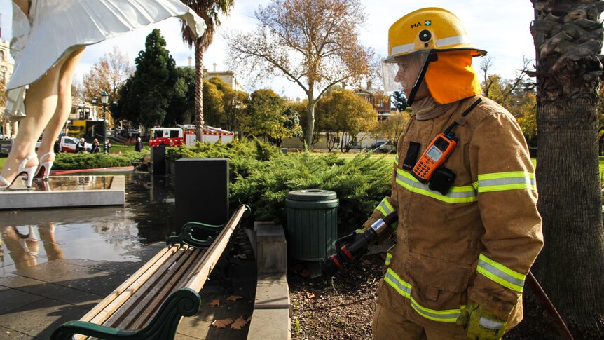 Beau Cook from the Bendigo Fire Station has finished giving Marilyn her wash.