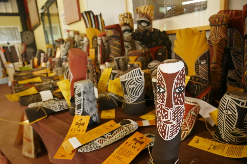 Tiwi art work sits in an art centre.