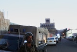 Police troopers block Yemen street