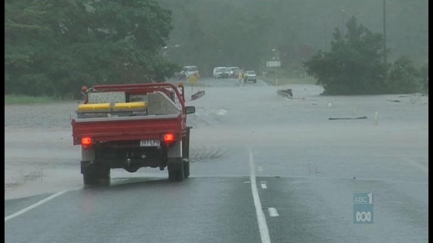 Heavy rain cut the Bruce highway north of Proserpine most of Monday, blocking access to Airlie Beach and Cannonvale.