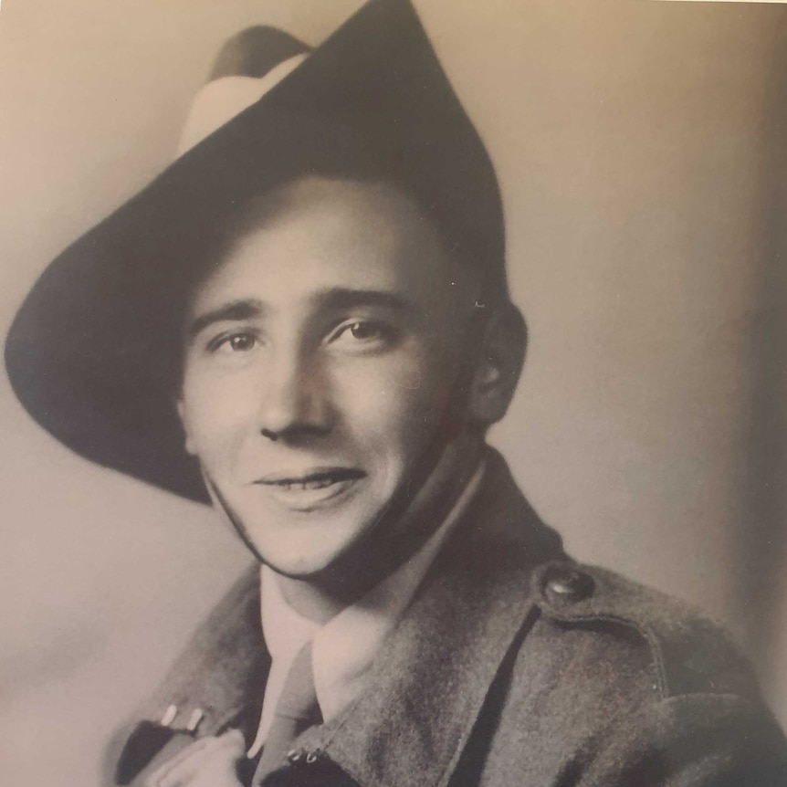 A black and white image of a young man in an early Australian army uniform.