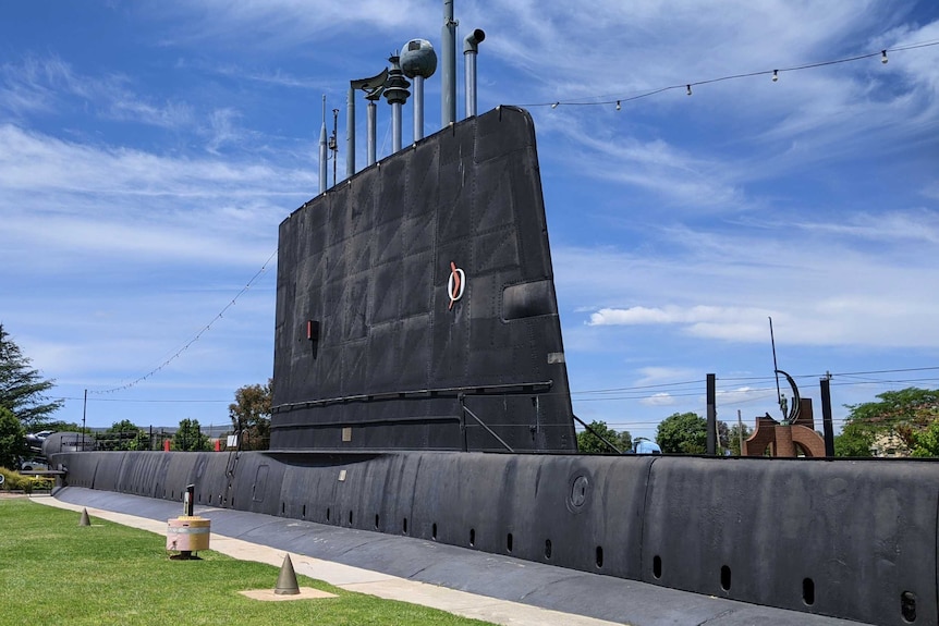 A black submarine on display in Holbrook.