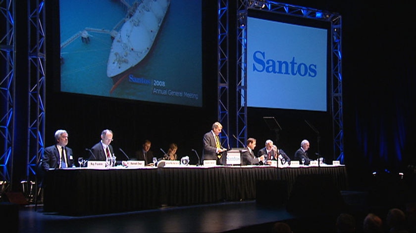 Executives on stage at a Santos annual general meeting in Adelaide.