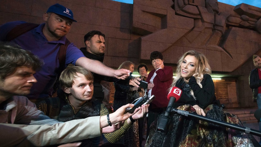 Yulia Samoylova, who was chosen to represent Russia in the 2017 Eurovision, speaks to media.