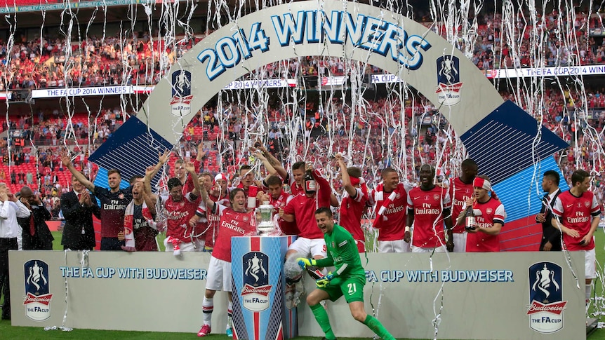 Arsenal celebrates with the FA Cup