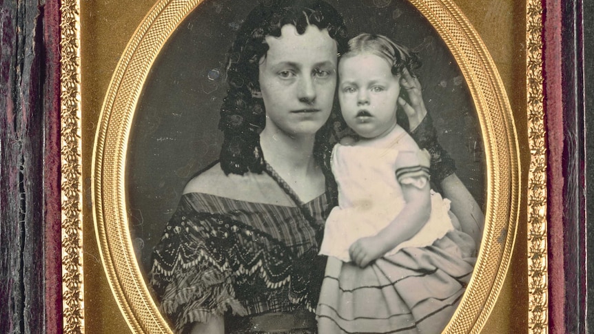 Old daguerrotype image of mother and child from 1855