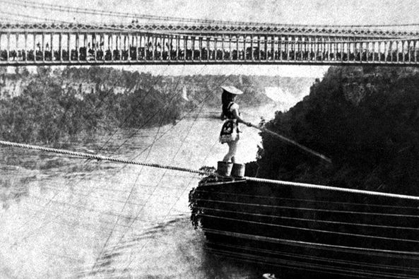 Maria Spelterini walks a tightrope over the Niagara Gorge in 1876