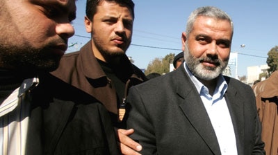 Hamas leader Ismail Haniyeh arrives for a meeting in Gaza.