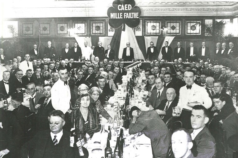 People attend a dinner held inside Tara House of the Queensland Irish Association in Brisbane's CBD in 1945.