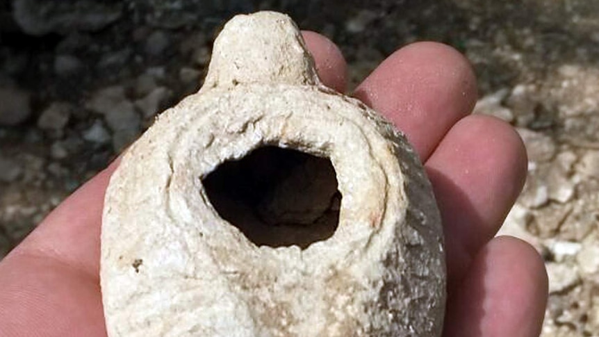 An ancient lamp uncovered by a porcupine in Israel