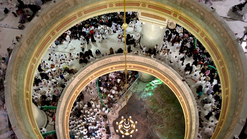 A birds-eye view of worshippers praying in the Grand Mosque.