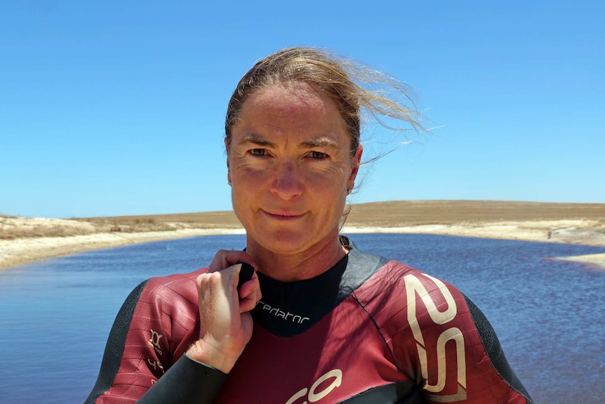 Portrait of Caroline Ashby in front of dam