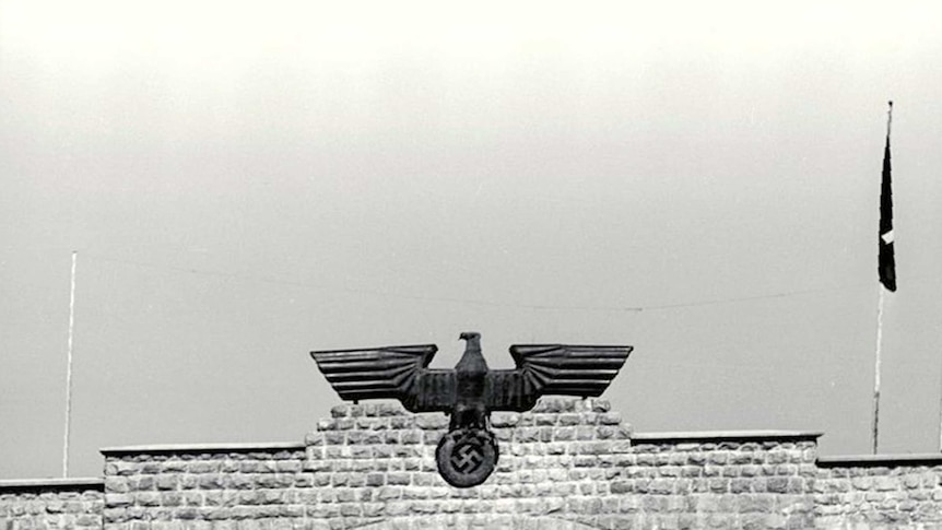 A gate topped with the Eagle and Swastika of Germany's Third Reich pictured at Mauthausen, Austria's largest concentration camp.