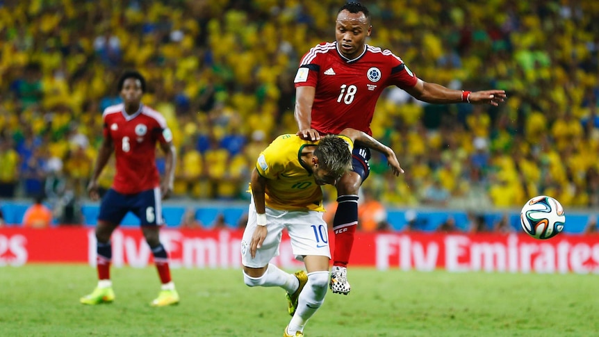 Zuniga thumps Neymar in the back