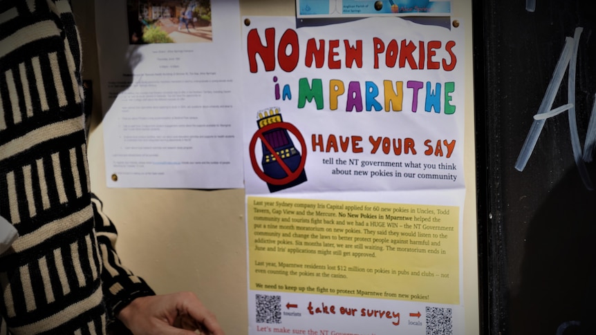 A colourful flyer calling for no new pokies in Alice Springs