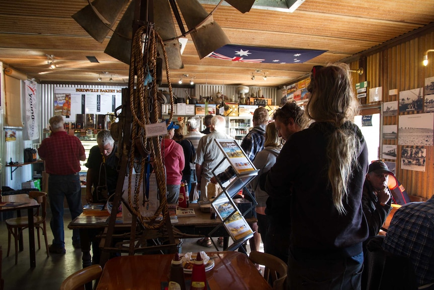 A line of people waiting to order inside the Birdsville bakery