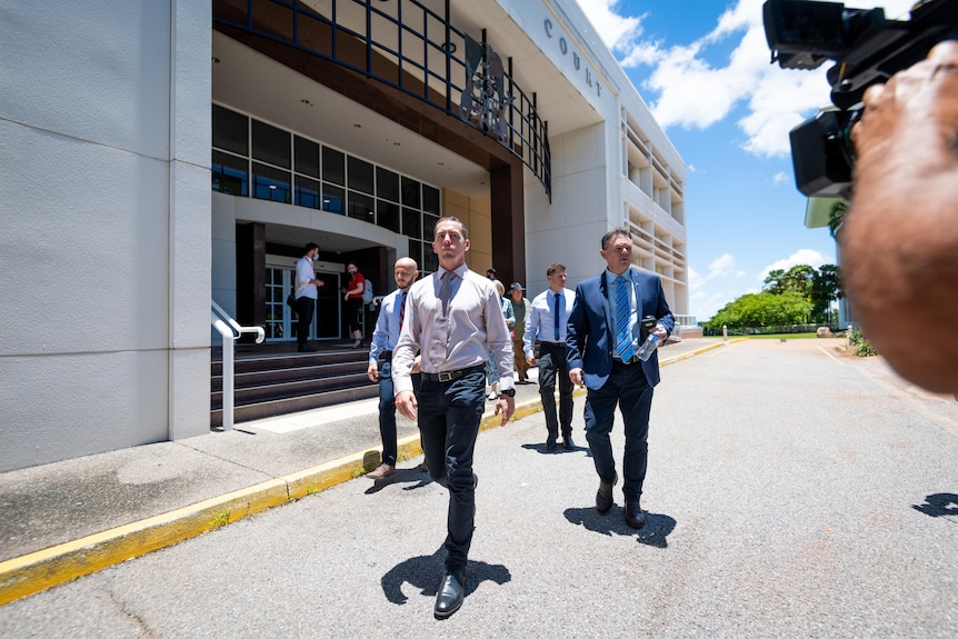 Constable Rolfe Arrives At The Nt Supreme Court With His Legal Team.